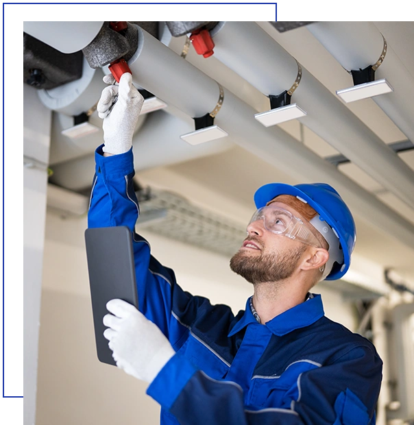 PVC Water Pipe Inspection By Construction Worker