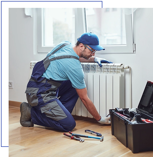 Central heating mechanic and handyman fixing home radiator, gas crisis and seasonal issues.