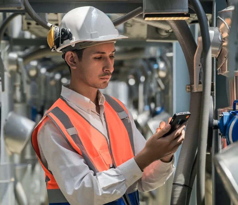 Engineers inspect gas and water pipes for power and cooling in industrial and building systems.